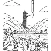 Dibujo para colorear de un cohete despegando mientras las familias miran de lejos